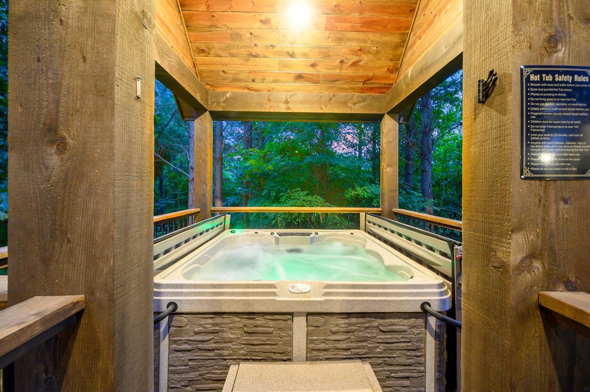 Private hot tub on the deck at dusk