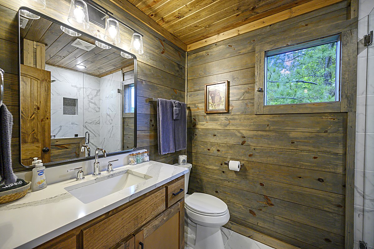 Bright bathroom with double vanity and window light