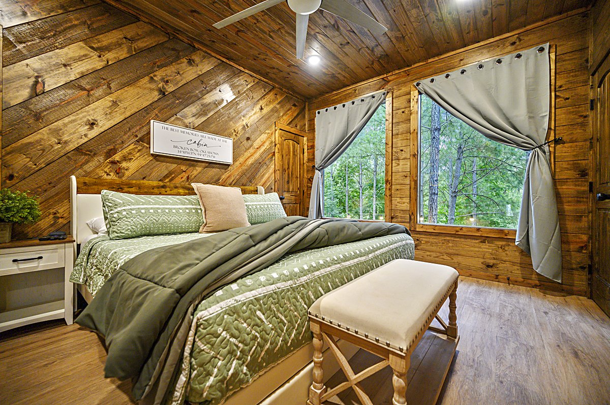 Guest room with chevron wood wall